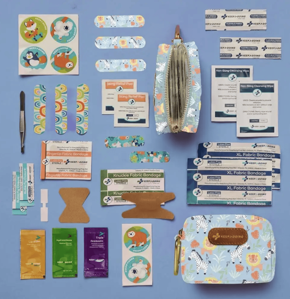 KEEP GOING First Aid MiniKit travel first aid kit with bandages wipes and supplies