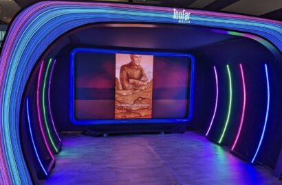 SXSW Emerging Tech Expo exhibition floor with technology displays and lighting installation