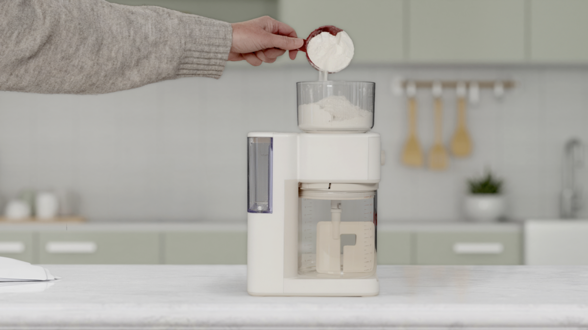 Baker preparing sourdough starter using the Sourdough Sidekick and King Arthur flour